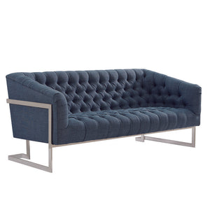 The Louise Tufted Apartment Sofa upholstered in Blue cotton