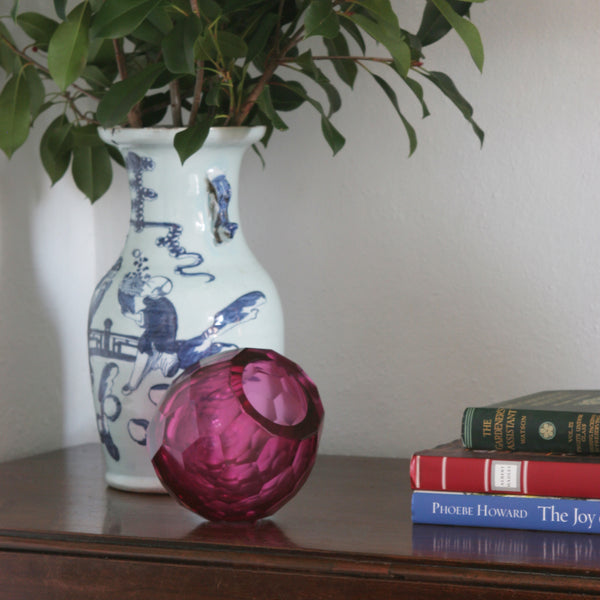 Faceted Geometric Glass Vase in Magenta on table