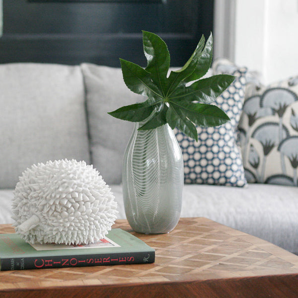  Smokey gray glass vase on table